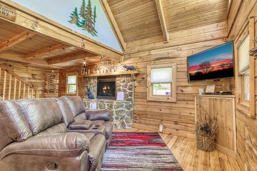 Living room with flat screen tv at Afternoon Delight - 1 bedroom cabin near Pigeon Forge